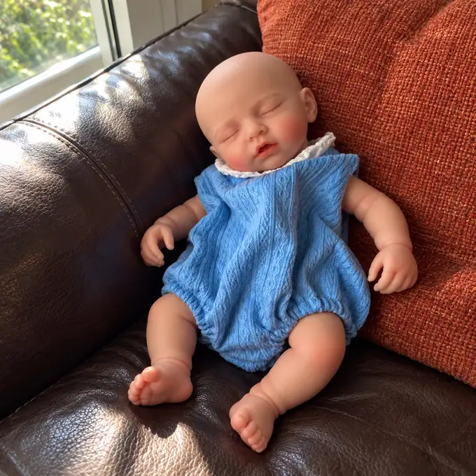 Photograph of alfie in a home setting