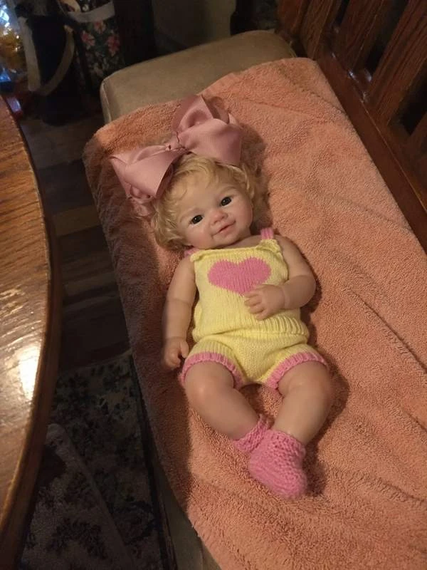 Photograph of clara in a home setting