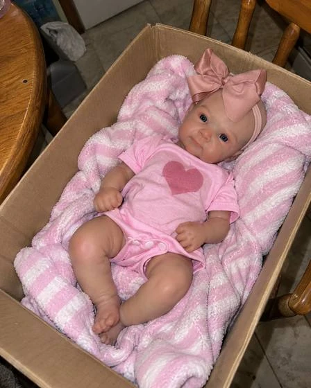 Photograph of esme in a home setting