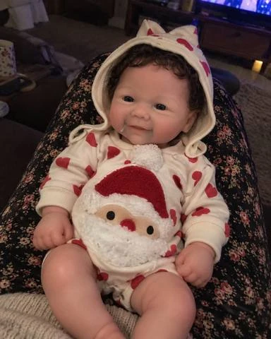 Photograph of maisie in a home setting